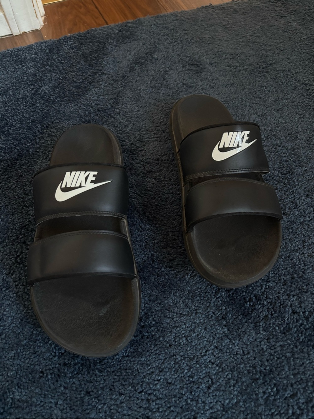 Nike Black Women’s Slide Sandals with White Swoosh